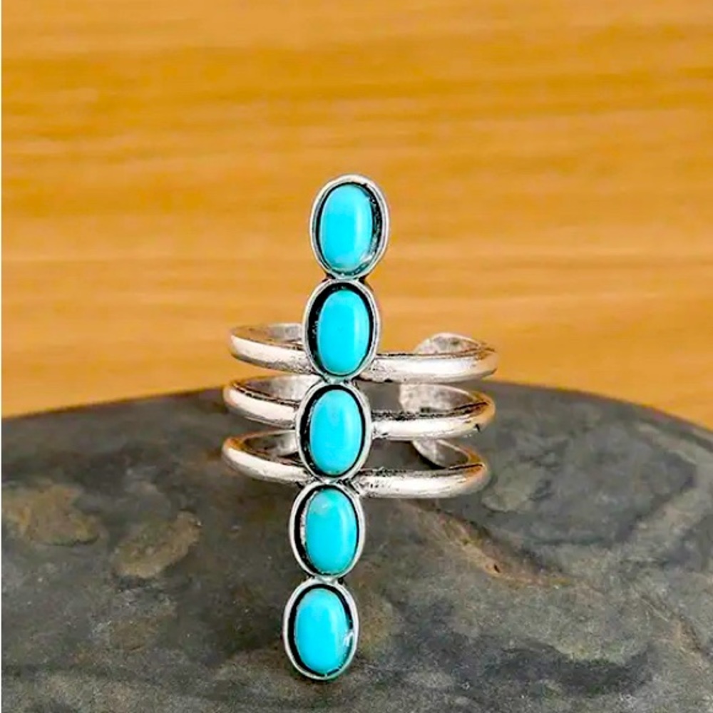 Turquoise ring.